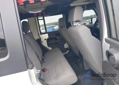 2007 Jeep Wrangler Unlimited Sahara from USA, damaged, VIN 1J4GA59127L211076